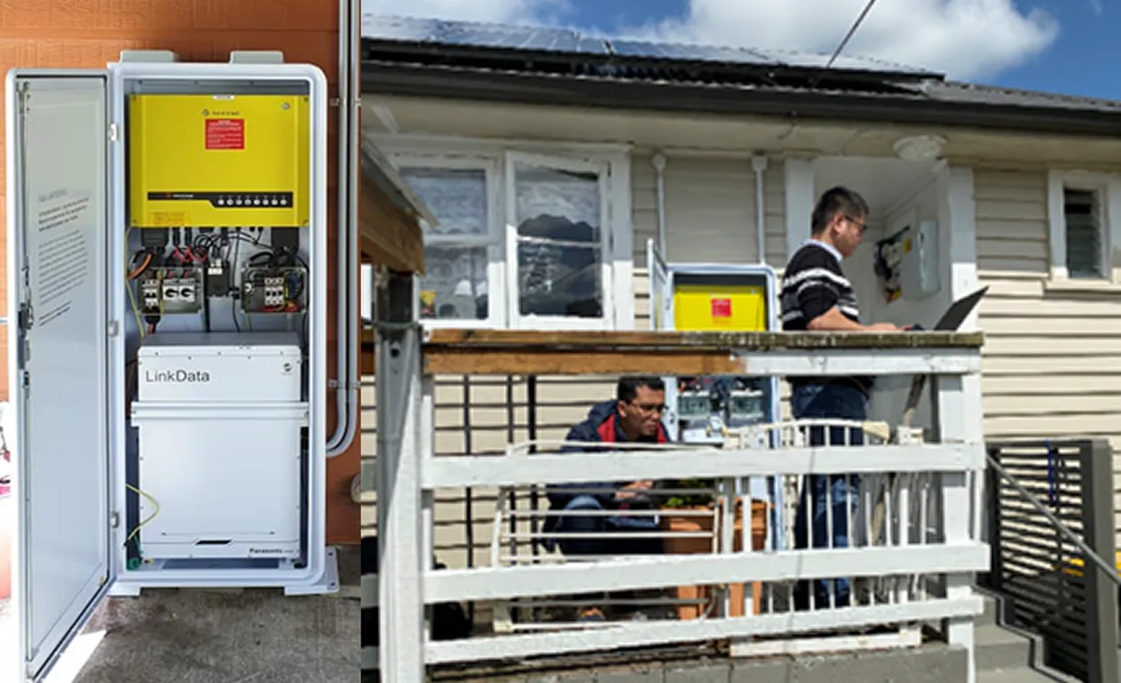 Home energy storage cabinet and W2E engineers commissioning a residential solar system